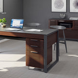 BDi Corridor 6507 Mobile File Cabinet in Chocolate Stained Walnut, under a desk in an office