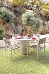 Dash & Albert Diamond Handwoven Indoor/Outdoor Rug in Sprout / White, patio setting