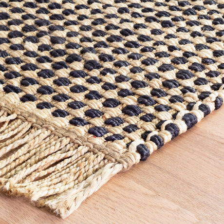 Dash & Albert Kuba Handwoven Jute Rug in Black, corner detail