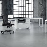 BDi Centro 6417 Multi Function Cabinet in Satin White on Oak with Grey Glass, supporting two desk tops, in a loft office