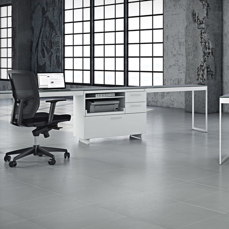 BDi Centro 6417 Multi Function Cabinet in Satin White on Oak with Grey Glass, supporting two desk tops, in a loft office