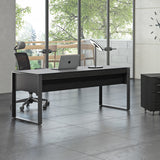 BDi Corridor 6521 Executive Office Desk in Charcoal Stained Ash, seen from the back beside a file pedestal and multi-function cabinet