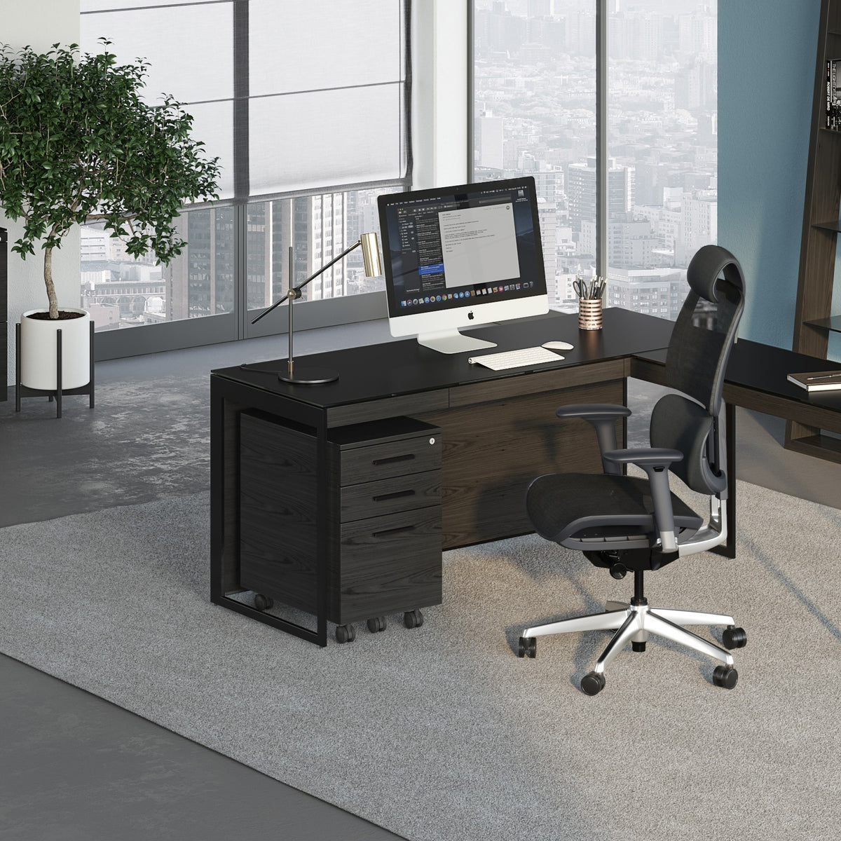 BDi Sequel 20 6101 Desk in Charcoal Stained Ash, with a black frame, return and mobile file, in an office