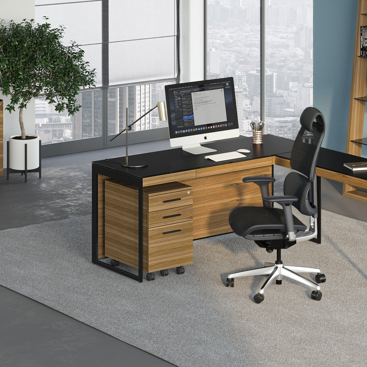 BDi Sequel 20 6101 Desk in Natural Walnut, with a black frame, return and mobile file, in an office