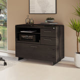 BDi Sequel 20 6117 Multi Function Cabinet in Charcoal Stained Ash, with a black base, beside a desk, in a home office
