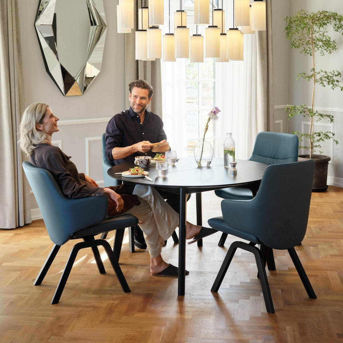 Stressless Mint Low Back Dining Chair with Vertical Legs (D100), room setting, shown in Paloma Teal Blue, D200 all-groups