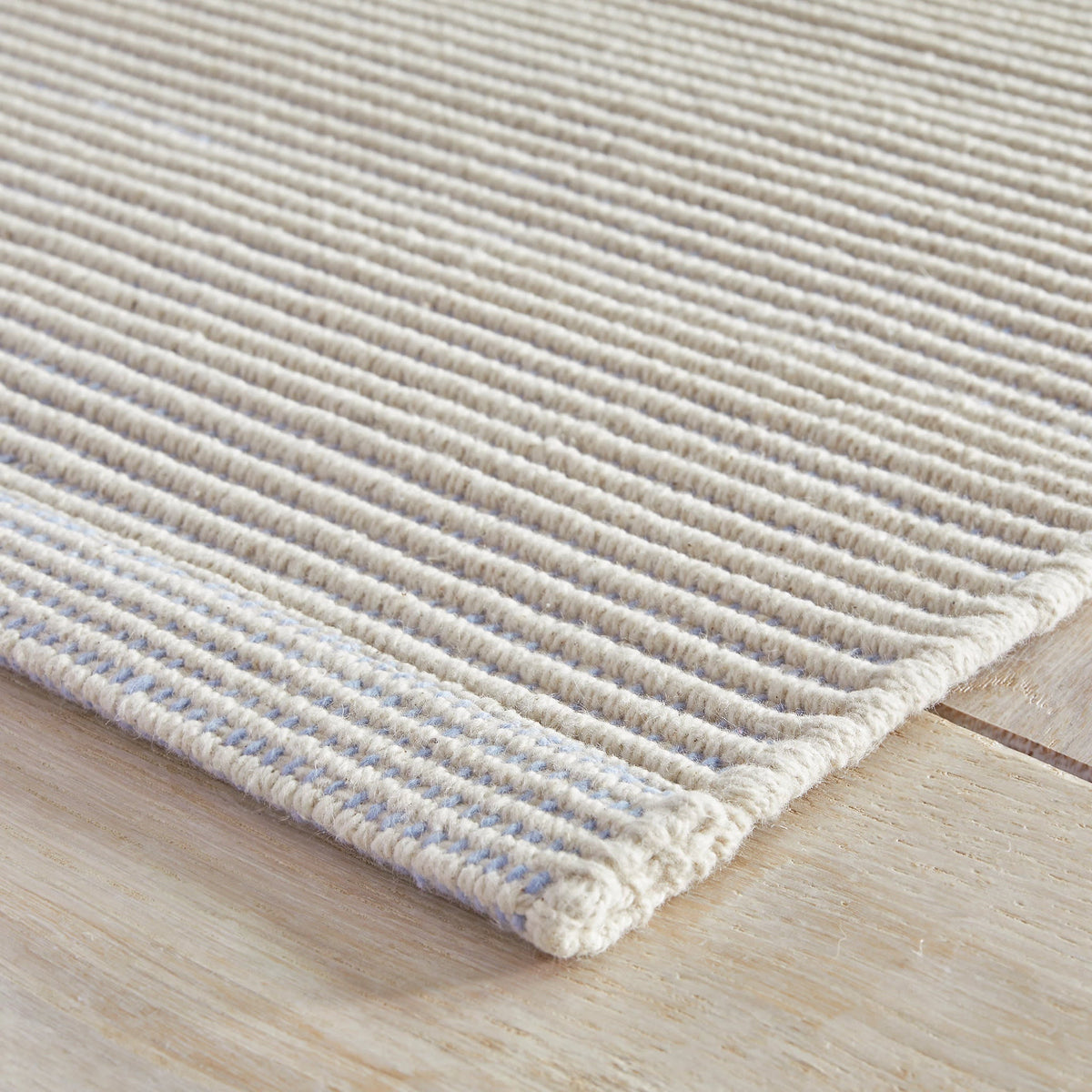 Dash & Albert Haverhill Handwoven Cotton Rug in French Blue, edge detail