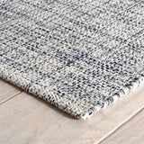 Dash & Albert Marled Handwoven Cotton Rug in Indigo, corner detail
