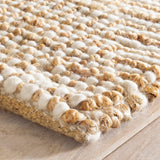 Dash & Albert Kelan Handwoven Jute Rug in Ivory, corner detail