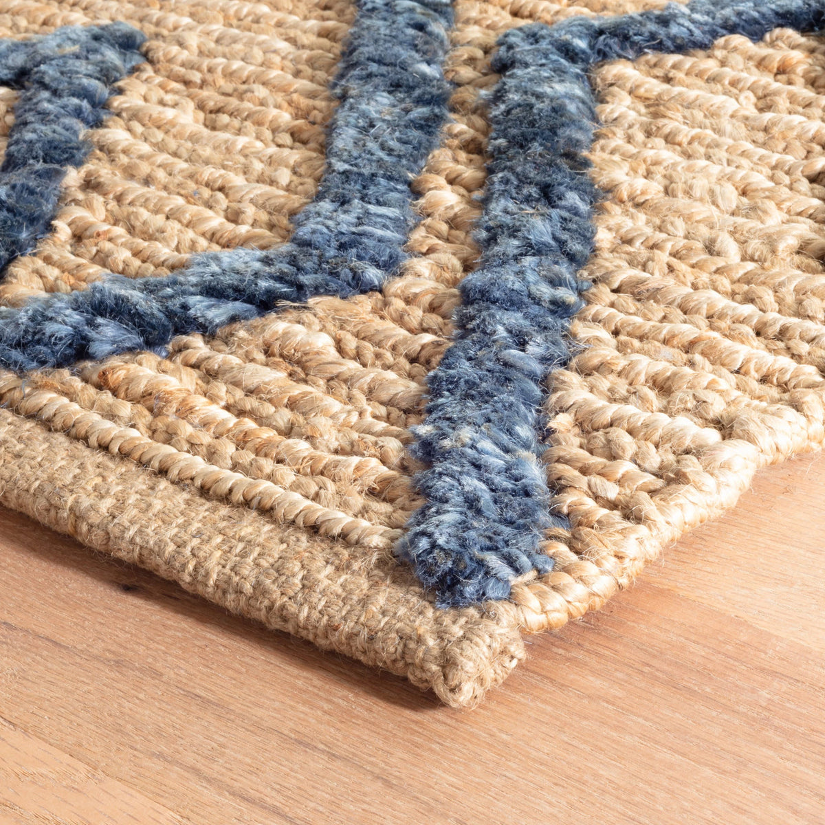 Dash & Albert Marco Jute Soumak Handwoven Rug in Navy, corner detail