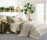 Dash & Albert Samson Handwoven Indoor/Outdoor Rug in Navy, bedroom setting