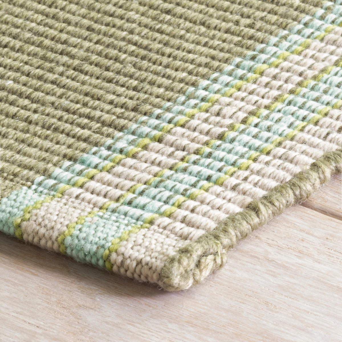 Dash & Albert Stone Soup Handwoven Indoor/Outdoor Rug in Multi, corner detail