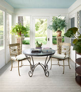 Dash & Albert Samson Handwoven Indoor/Outdoor Rug in Grey, sunroom setting