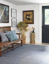 Dash & Albert Samson Handwoven Indoor/Outdoor Rug in Navy, entry setting