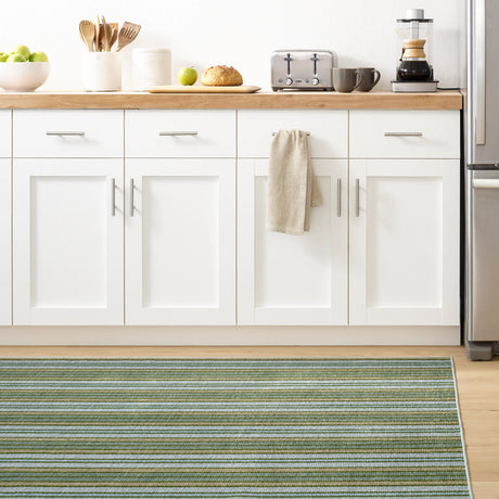 Dash & Albert Caravan Stripe Machine Washable Rug in Multi, kitchen setting