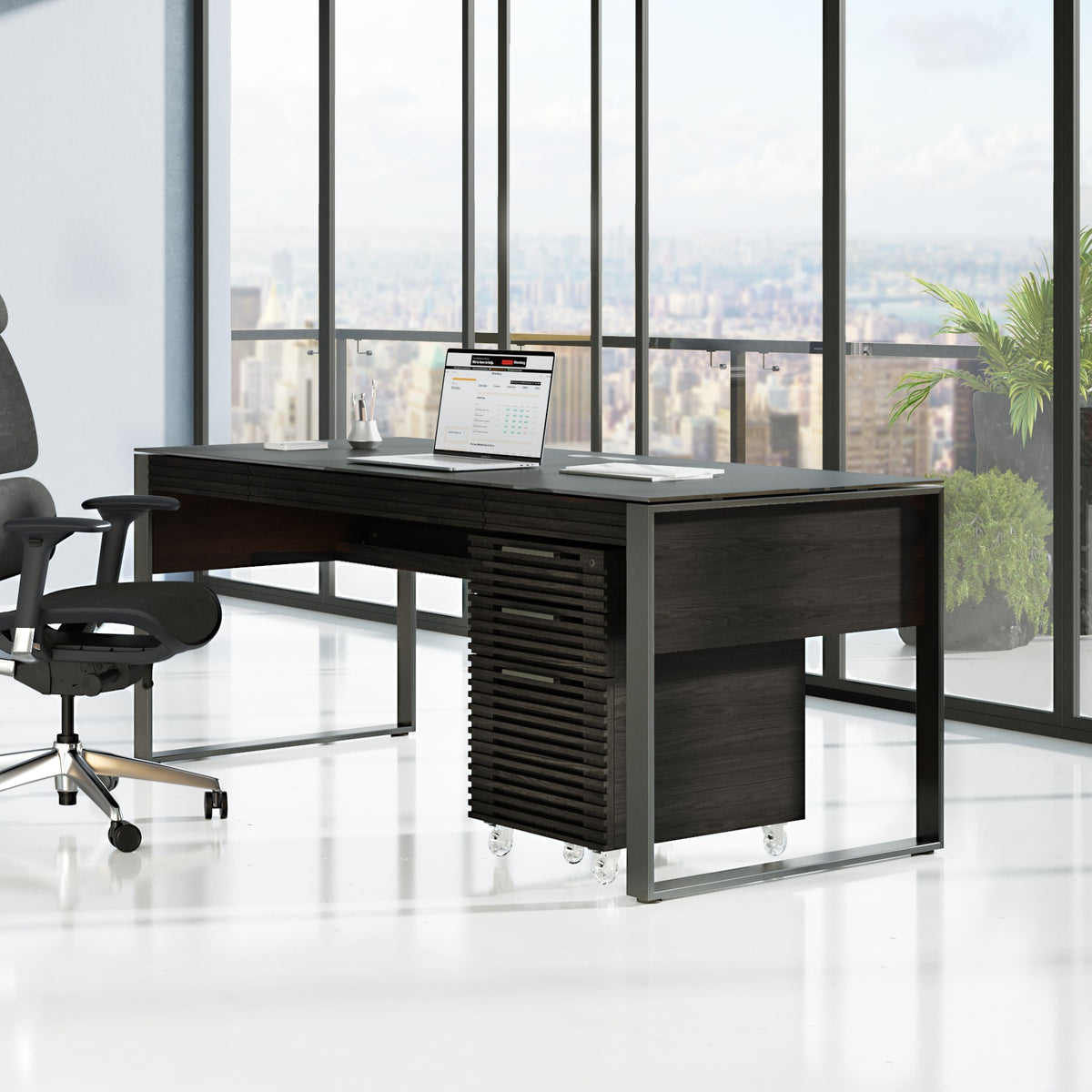 BDi Corridor 6521 Executive Office Desk in Charcoal Stained Ash, in a city office with a file pedestal and credenza