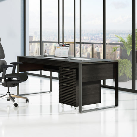 BDi Corridor 6521 Executive Office Desk in Charcoal Stained Ash, in a city office with a file pedestal and credenza
