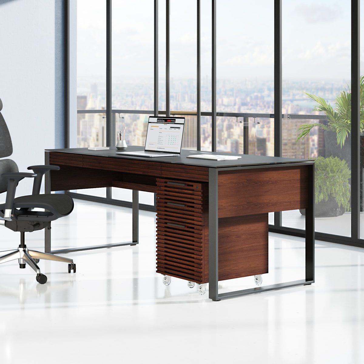BDi Corridor 6521 Executive Office Desk in Chocolate Stained Walnut, in a city office with a file pedestal and credenza