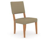 Canadel Upholstered Dining Chair 5051 in XY Faux Leather and 01 Honey Washed, three-quarter view