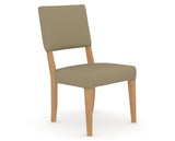 Canadel Upholstered Dining Chair 5051 in XY Faux Leather and 20 Caramel Washed, three-quarter view