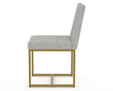 Canadel Modern Upholstered Dining Chair 5174 in 7C Fabric with a gold metal frame, side view