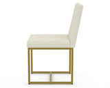 Canadel Modern Upholstered Dining Chair 5174 in TW Fabric with a gold metal frame, side view