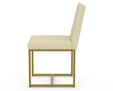 Canadel Modern Upholstered Dining Chair 5174 in XZ Faux Leather with a gold metal frame, side view