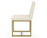 Canadel Modern Upholstered Dining Chair 5174 in YJ Faux Leather with a gold metal frame, side view