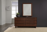 West Bros Camber Landscape Mirror in 88 Umber, above the dresser in a room setting