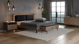 BDi Linq Bench in Pepper | Leather, with a Natural Walnut frame, at the foot of a bed with Contour cushions