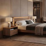 BDi Linq Nightstand in Natural Walnut, 28-inch, beside a bed in a bedroom with a bench