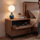 BDi Linq Nightstand in Natural Walnut, 28-inch, a woman pulling out the tray