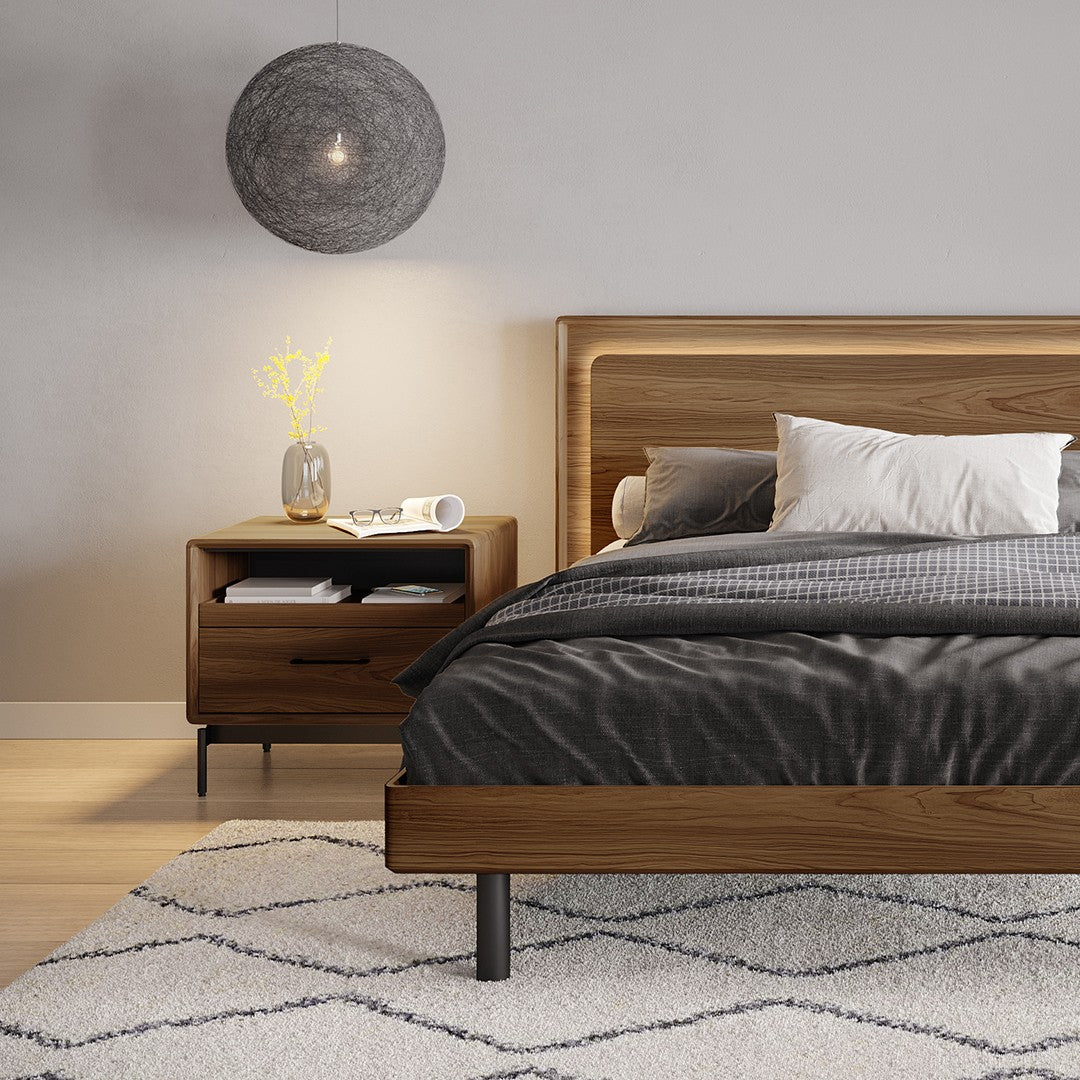 BDi Linq Nightstand in Natural Walnut, 28-inch, a pair beside a bed, front view