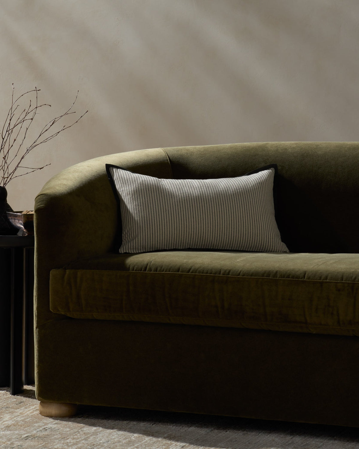 Jeremiah Brent x Loloi Sullivan Pillow in Natural / Black, room setting, 13" x 21"