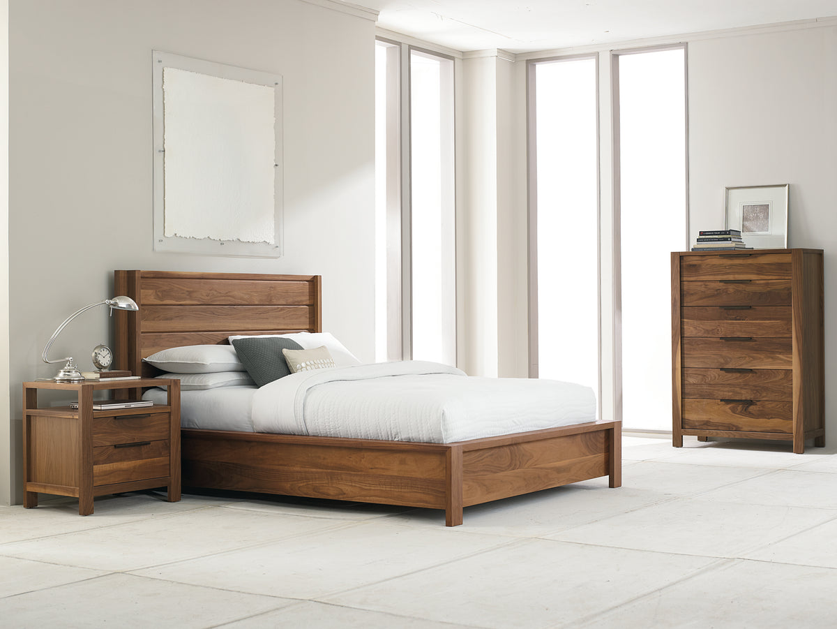 West Bros Phase Bedside Chest in 79 Toast, beside the bed in a room setting