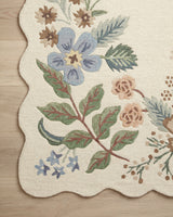 Rifle Paper Co. x Loloi Silhouette Rug 02 in Cream, corner on a wood floor
