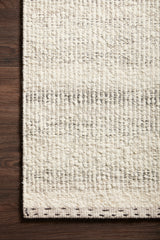 Loloi Sloane Rug 01 in Mist, corner on a wood floor