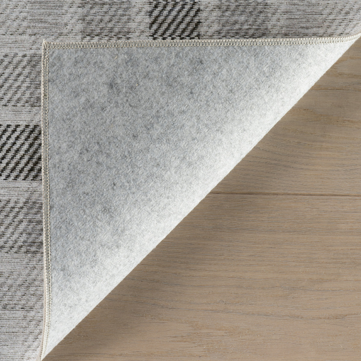 Andri Modern Plaid Machine Washable Rug