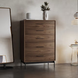 BDi Linq 9185 5 Drawer Chest in Natural Walnut, beside a floor mirror in a bedroom