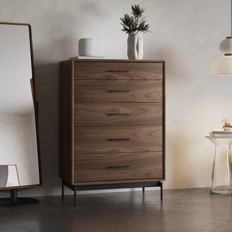 BDi Linq 9185 5 Drawer Chest in Natural Walnut, beside a floor mirror in a bedroom