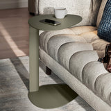 BDi Bink Laptop Stand / Side Table in Moss, beside a sofa in a living room