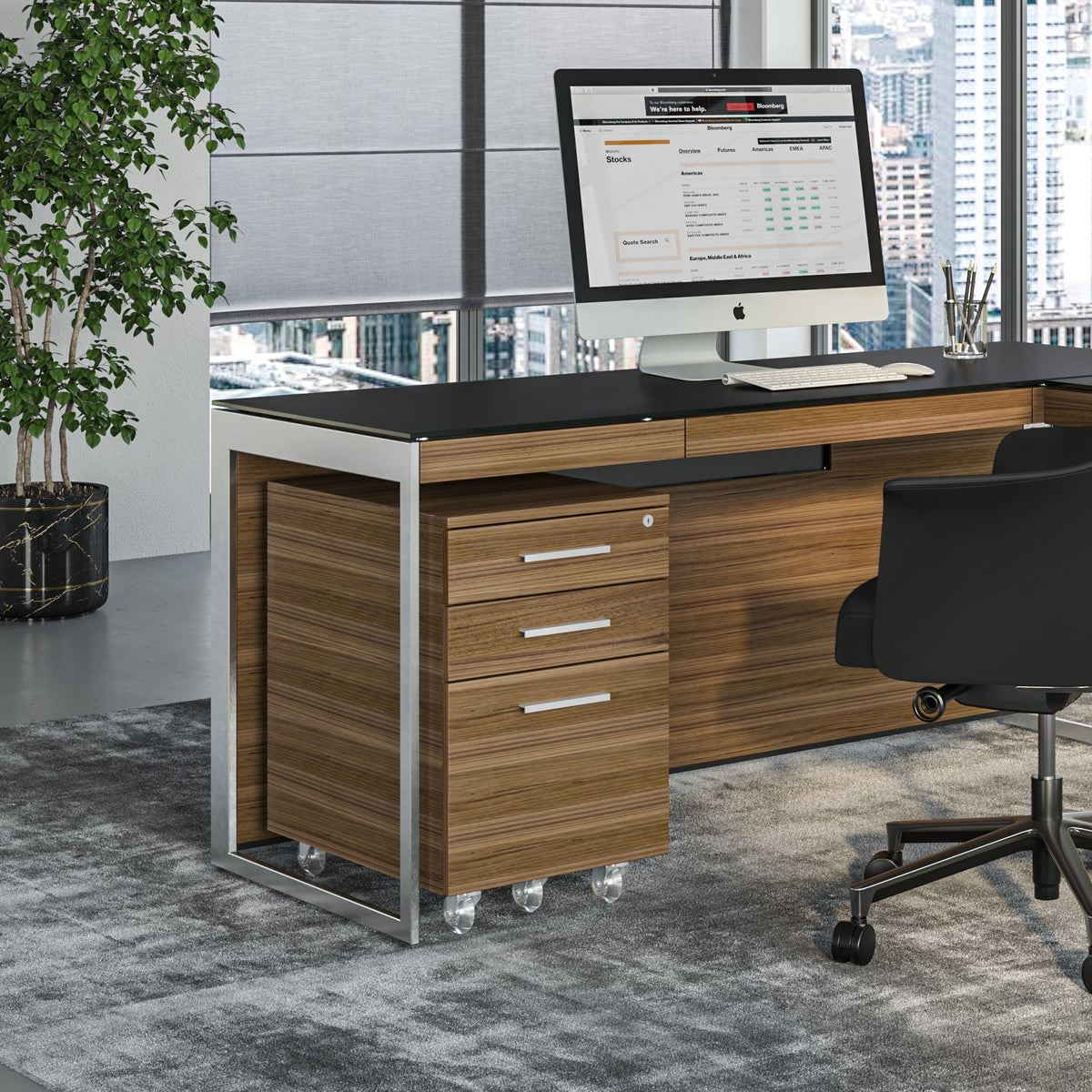 BDi Sequel 20 6107 Mobile File Cabinet in Natural Walnut, under an L-shaped desk with an executive chair