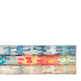 Dash & Albert Paint Chip Machine Washable Rug in Blue, Multicolour and Natural, rolled stack