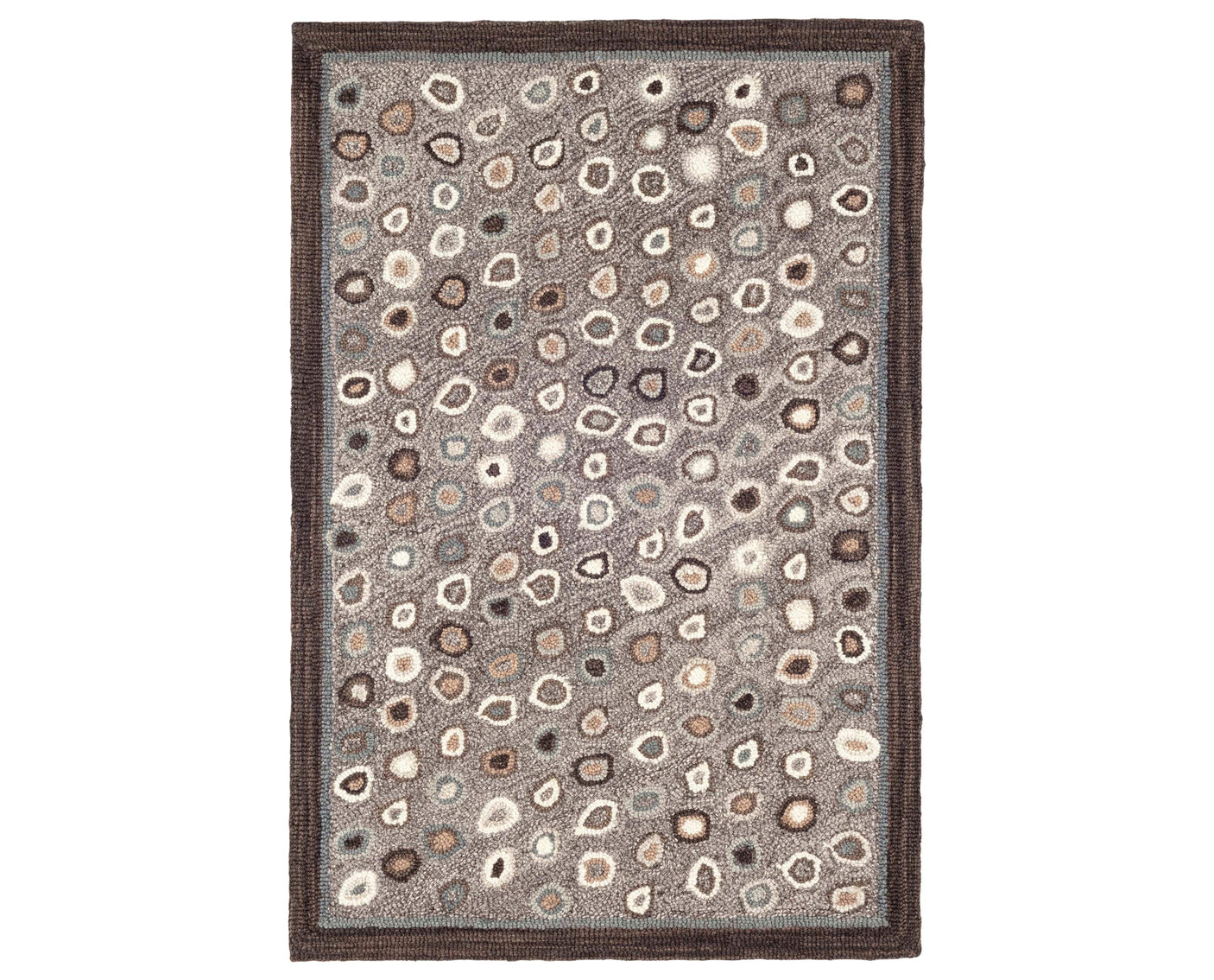 Rug with a Cat's Paw Hand Micro Hooked pattern on a plain background