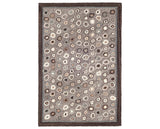 Rug with a Cat's Paw Hand Micro Hooked pattern on a plain background