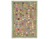 Rug with a Cat's Paw Hand Micro Hooked pattern on a plain background