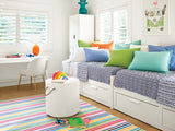 Dash & Albert Rainbow Stripe Machine Washable Rug in Multi, playroom setting