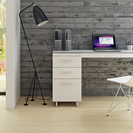 BDi Centro 6414 3 Drawer File Cabinet in Satin White on Oak with Grey Glass, supporting a desk top, in a home office