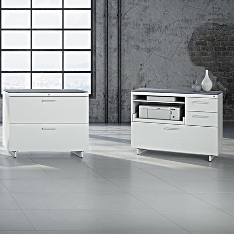 BDi Centro 6417 Multi Function Cabinet in Satin White on Oak with Grey Glass, with other Centro storage pieces, in a loft