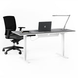 BDi Centro Sit+Stand Desk in Satin White on Oak with Grey Glass, 24 x 60 inch top, back view with a chair, on white, 24" x 60" Top size